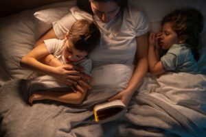 Reading together before bed is one of the simplest and most powerful parts of a nighttime routine. If you want to learn more about the benefits of reading, take a look at our post on 7 benefits of reading to your children.